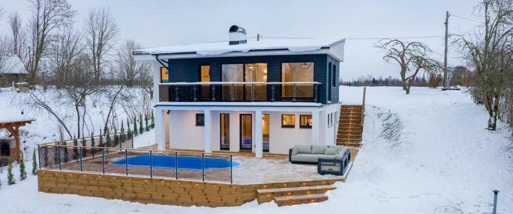 Kalda Villa holiday home with a heated outdoor pool in winter