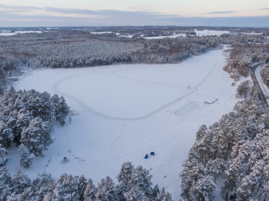 Verevi Lake in Elva, beautiful winter landscape and frozen lake surface in Tartu County.